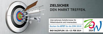 Möbelbeschläge treffen als Pfeile die Mitte einer Zielscheibe und werben für die ZOW 2014, eine internationale Zuliefermesse für Möbelindustrie und Innenausbau in Bad Salzuflen.