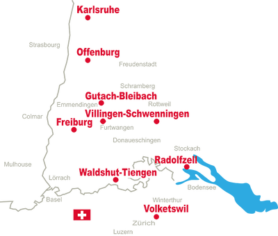Karte Mitteleuropas mit rot markierten Ländern, grauer Umrandung, blauen Küstenbereichen und drei eingezeichneten roten Paket-Symbolen in Norwegen, Deutschland und Italien