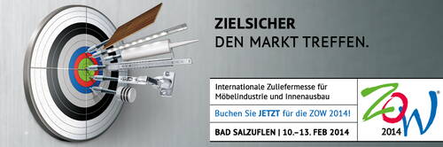 Möbelbeschläge treffen als Pfeile die Mitte einer Zielscheibe und werben für die ZOW 2014, eine internationale Zuliefermesse für Möbelindustrie und Innenausbau in Bad Salzuflen.