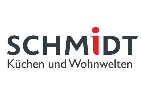 Schriftlogo „SCHMIDT Küchen und Wohnwelten“ mit rotem i-Punkt vor weißem Hintergrund