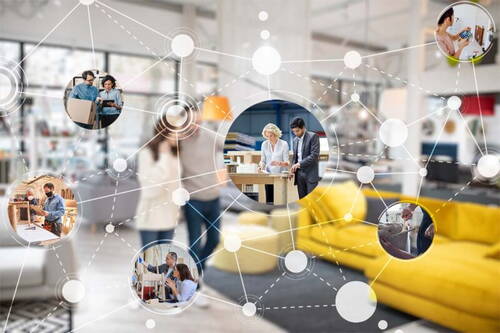Vernetzte Arbeitswelt mit verschiedenen Menschen in Werkstätten, Büros und Ateliers, die über ein digitales Netzwerk in einer modernen, offenen Wohnzimmerumgebung verbunden sind