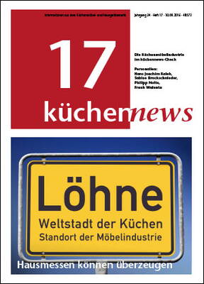 Titelseite der Fachzeitschrift „küchennews“ mit gelbem Ortsschild „Löhne – Weltstadt der Küchen, Standort der Möbelindustrie“ vor blauem Hintergrund
