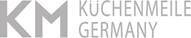 Graues KM-Logo mit der Aufschrift „Küchenmeile Germany“ in moderner, schmaler Schrift