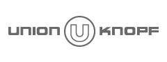 Graues Union Knopf Logo mit stilisiertem U in einem Kreis zwischen den Worten „Union“ und „Knopf“
