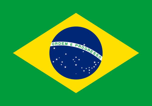 Grün-gelbe Flagge Brasiliens mit blauem Sternenkreis und weißem Banner „Ordem e Progresso“